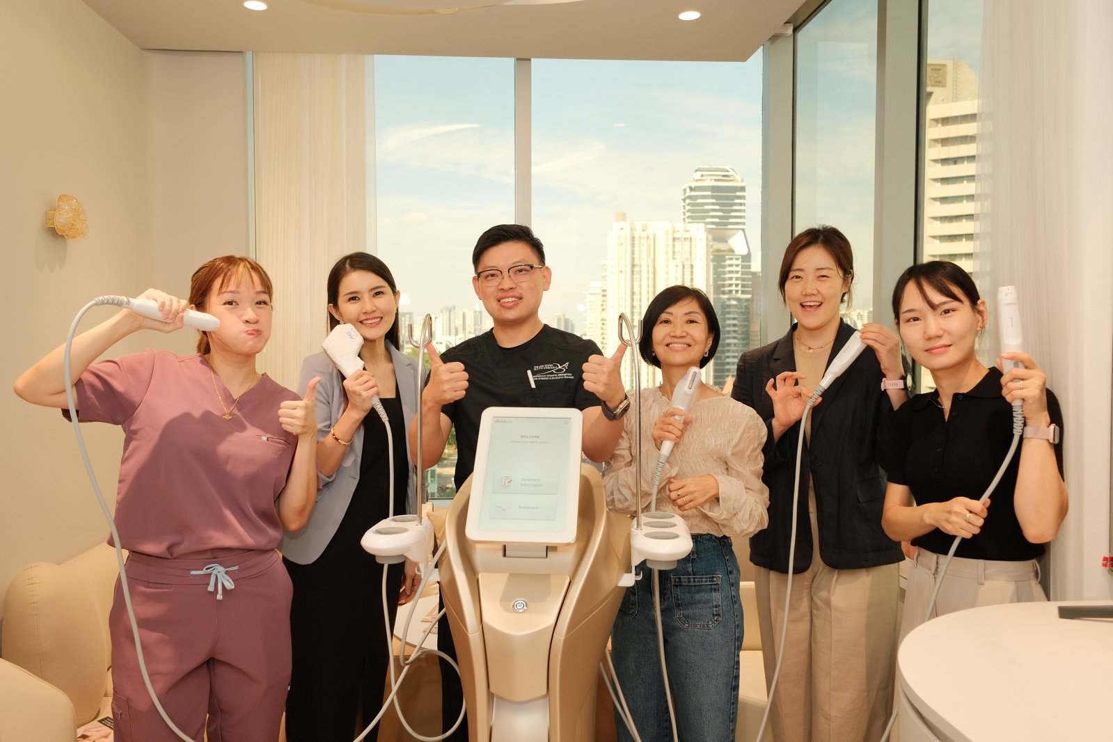 Dr Sin Yong with his clinic team